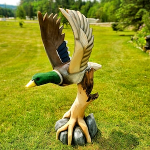 Mallard duck carving. Duck sculpture. Chainsaw carved duck.