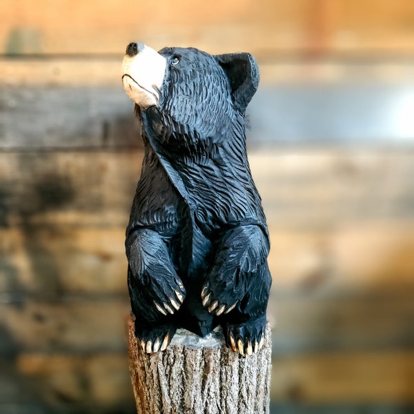 Chainsaw carved bear. Door greeter. Bear sitting on a ledge. Chainsaw carving. Made in newhampshire.