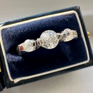 Vintage Platinum 0.55 CTW Old Mine Cut Three Stone Diamond Ring