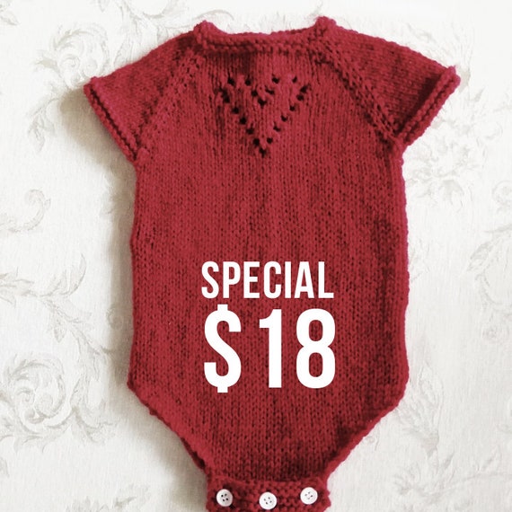 red newborn onesie
