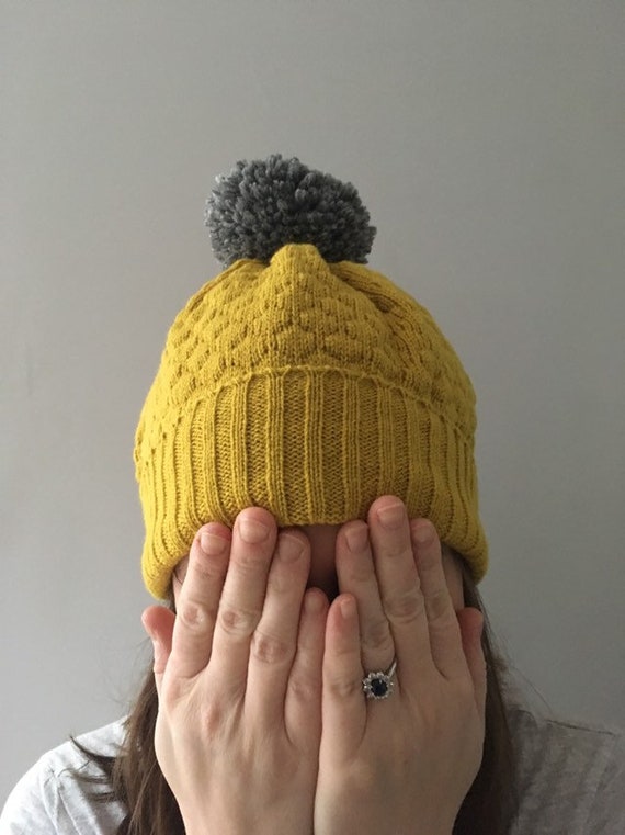 mustard bobble hat