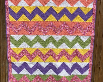 Bright yellow pink orange purple chevron quilt