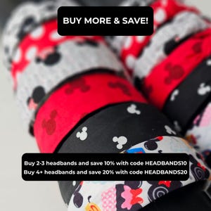 May include: A stack of fabric headbands featuring various patterns including red with white polka dots, black with white mouse silhouettes, and white with colorful character prints. Text overlays read: BUY MORE & SAVE! Buy 2-3 headbands and save 10% with code HEADBANDS10. Buy 4+ headbands and save 20% with code HEADBANDS20.
