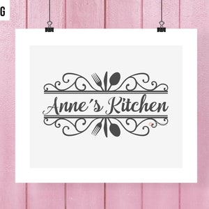 May include: A black and white kitchen logo with a decorative flourish and the text "Anne's Kitchen".