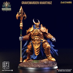 May include: A pre-supported 3D printed miniature of a skeletal warrior, Gravewarden Kharthuz, wearing golden armor and a blue cape, holding a spear with a golden tip. The miniature is set on a circular base with a rocky texture. The miniature is part of the Mortisbane Revenants collection by Clay Cyanide Miniatures.