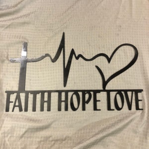 Industrial Rustic Faith Hope Love metal sign clear coated for indoor or outdoor use.