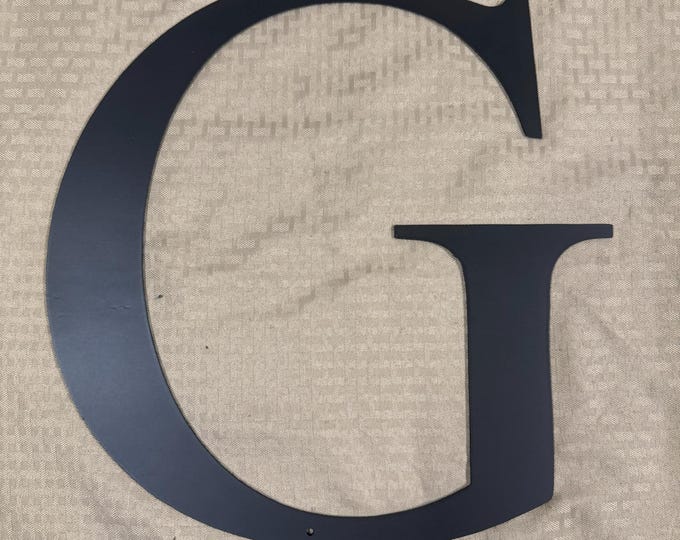Metal letter G