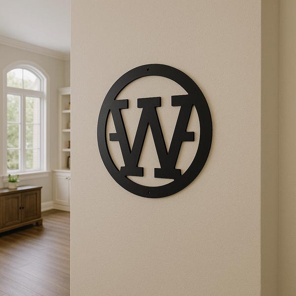 Metal letter W, cattle brand font with circle