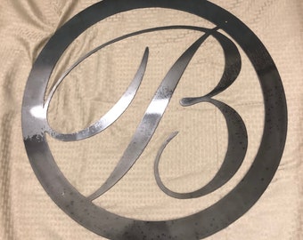 Metal letter B with circle