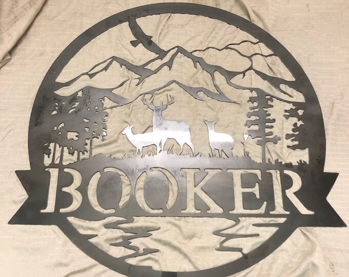 Outdoor scene with last name metal sign. Cut from 14 gauge steel