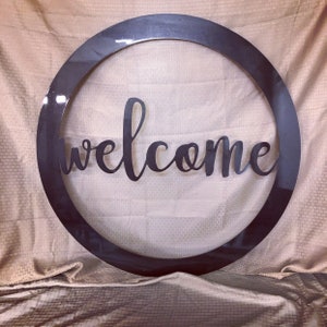 Welcome sign cut from 14 gauge steel