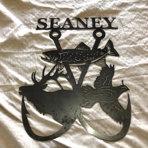 Double fishing hook with elk trout and quail. Cut from 14 gauge steel