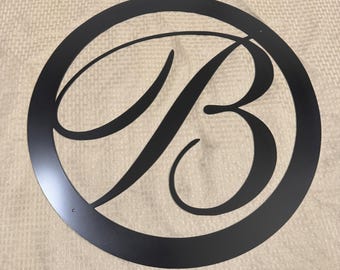 Metal letter B with circle