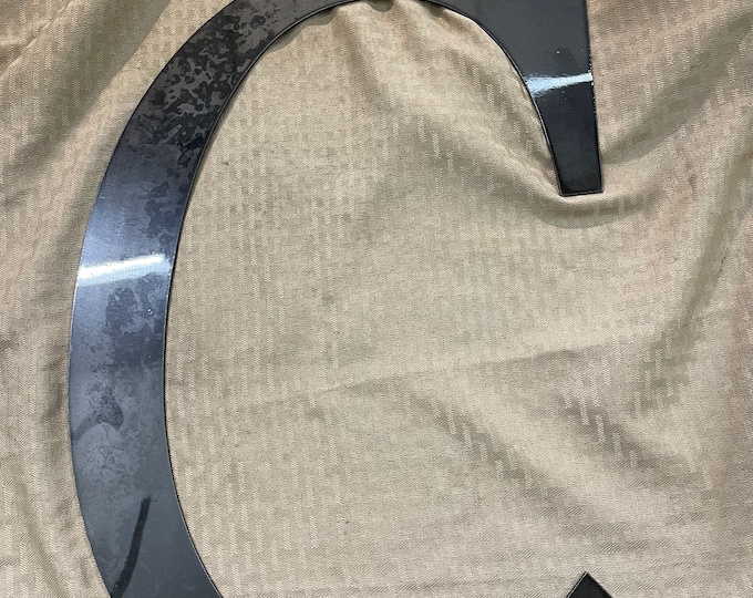 Metal letter C