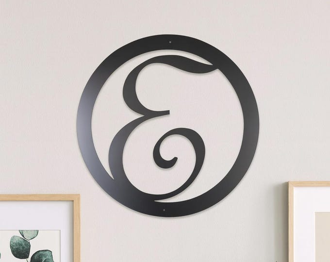 Metal letter E in circle