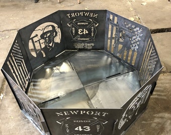 Fire pit. Cut from 14 gauge steel. Interlocking 18”x20” panels. lineman panels.