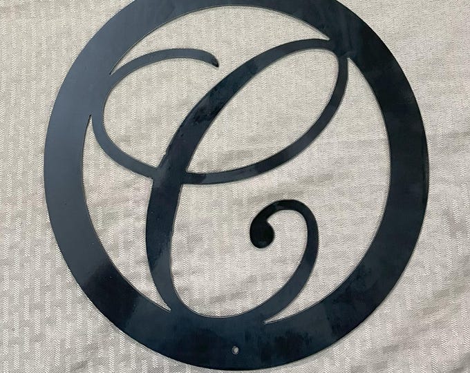 Metal letter C in circle