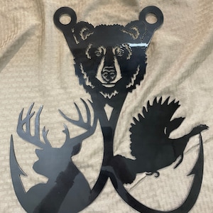 Double fishing hook with deer turkey and bear. Cut from 14 gauge steel with coating