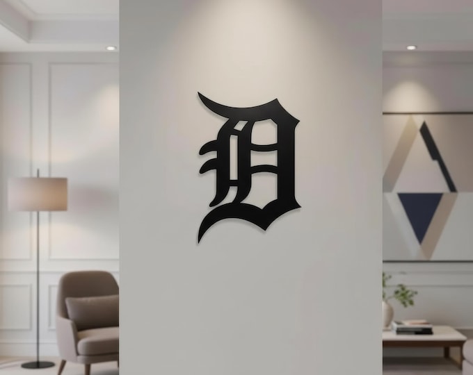 Metal letter D in old English style, cut from 14 gauge steel