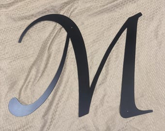 Metal letter M