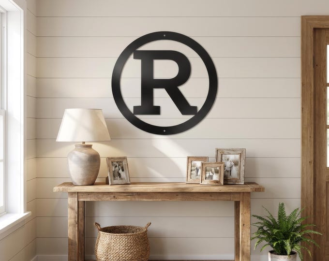 Metal letter R in circle