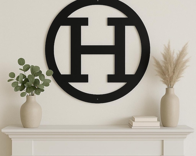 Metal letter H with circle