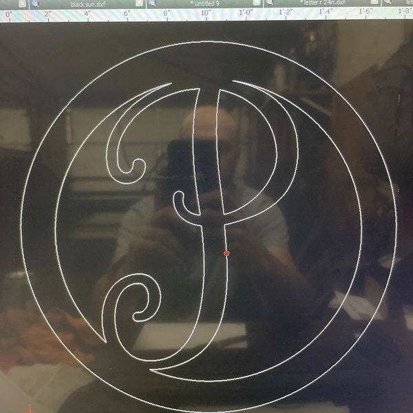 Metal letter P in circle