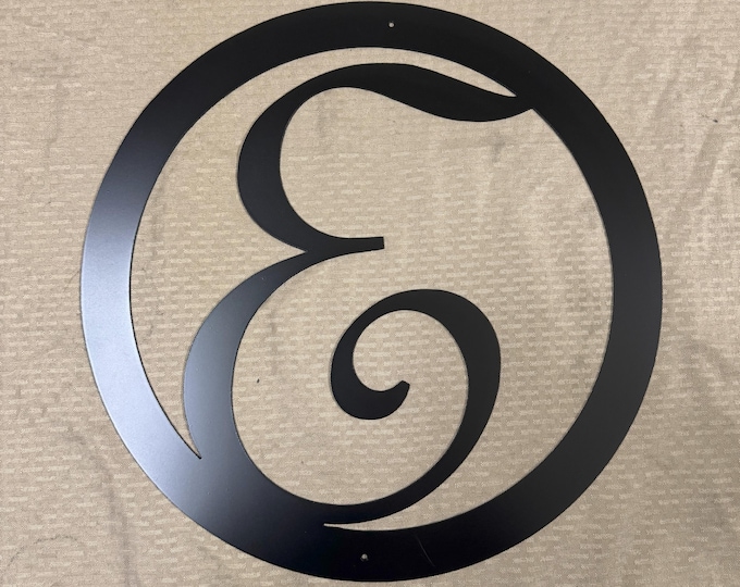 Metal letter E in circle