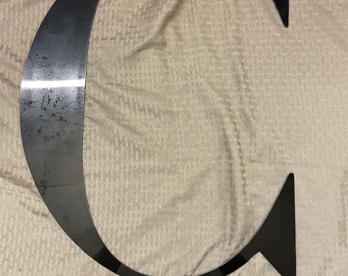 Metal letter C