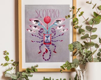 May include: A framed print featuring a stylized Scorpio zodiac illustration. The artwork displays a scorpion-like figure with multiple eyes and the word "SCORPIO" at the top. The image is surrounded by plants, including cacti and eucalyptus.