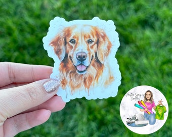 Op de afbeelding: Een sticker in aquarelstijl met een golden retriever die een gelukkige uitdrukking heeft. De sticker is op een witte achtergrond met een subtiel aquareleffect.