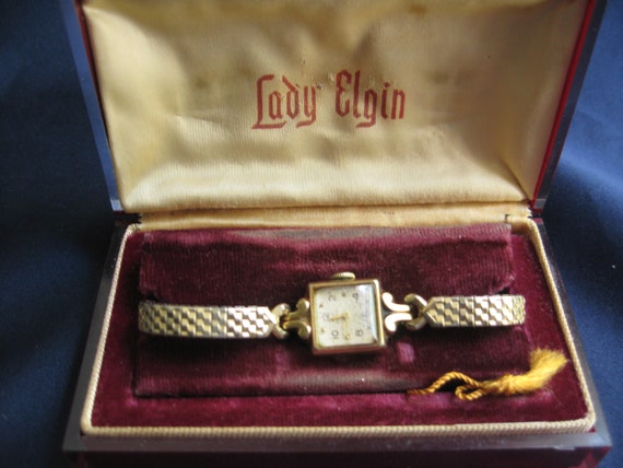 Lady Elgin wristwatch in original Lucite box, Vint
