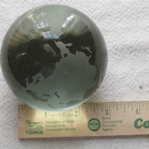 AT&T globe glass paperweight
