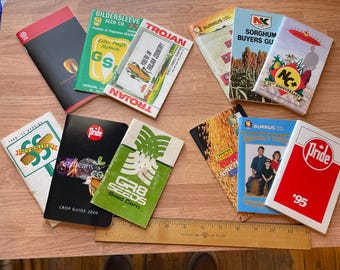 Vintage advertising lot of 12 Corn soybean Field seed pocket guides, farm life memorabilia