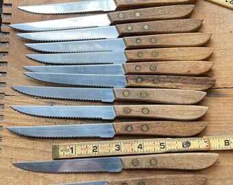 Lot of 12 steak knives stainless wood handle serrated knives