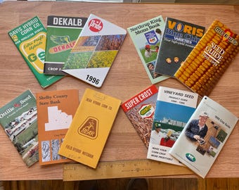 Vintage advertising lot of 12 Corn soybean Field seed pocket guides, farm life memorabilia