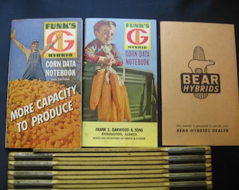 May include: Three vintage corn seed company brochures. The first two are for Funk's G Hybrid Corn Data Notebook, 24th Edition. The third is for Bear Hybrids. The first brochure features a pile of corn and a man standing on top of it. The second brochure features a young boy holding a bunch of corn. The third brochure features a bear logo with a corn stalk.