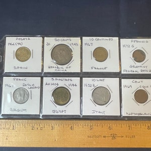 Vintage 8 coin lot 1942 Republic of China, Egypt, Germany, Spain, Belgium, Italy, France & Netherlands in protective sleeves.