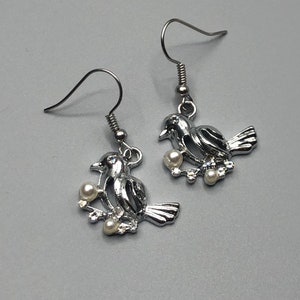 Oiseau sur une branche boucles d’oreilles
