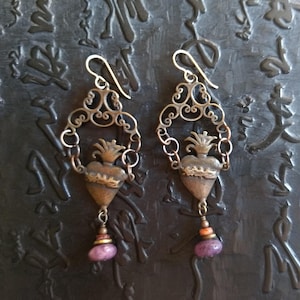 Cast from vintage milagros in bronze with lepidolite and spiny oyster shell earrings.  Lots of kinetic movement.  3 inches long.