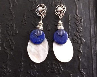 Two tone blue clip on earrings, translucent iolite, opaque lapis, mother of pearl and sterling silver.