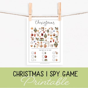 May include: A printable Christmas I Spy game with a white background and a watercolour illustration of Christmas items. The game includes a list of items to find and a section to mark how many of each item were found. The text on the game says "Christmas I Spy" and "How many did you find?"