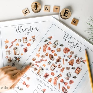 May include: Two printable "Winter I Spy" activity sheets with illustrations of winter-themed objects, such as mittens, snowflakes, and mugs of hot chocolate. The sheets have a checklist for counting how many objects are found.