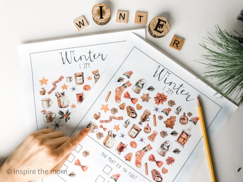 May include: Two printable "Winter I Spy" activity sheets with illustrations of winter-themed objects, such as mittens, snowflakes, and mugs of hot chocolate. The sheets have a checklist for counting how many objects are found.