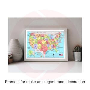 May include: A framed map of the United States, showcasing each state in a different color. The map includes labels for oceans, the Gulf of Mexico, and Canada. The American flag is displayed in the lower right corner. The text "Frame it for make an elegant room decoration" is at the bottom.
