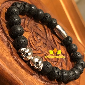 Double Skull Black Volcanic Lava Stone Beaded Stretch Bracelet