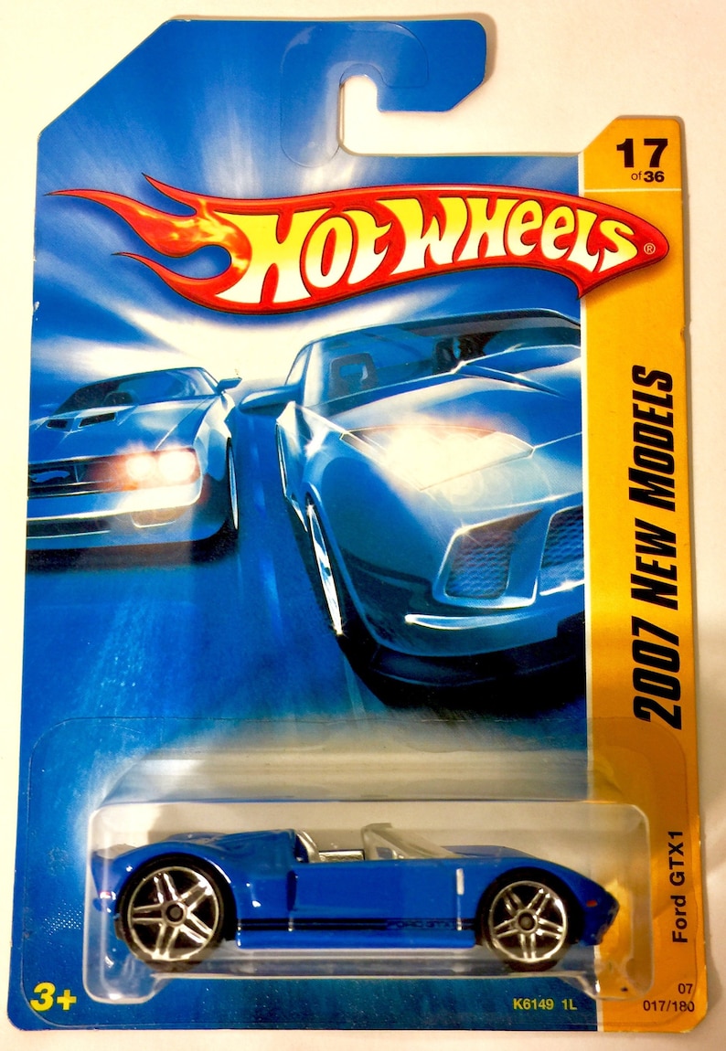 New Models #17180 Rare Hard To Find 5 spoke rims Free Shipping Ford GTX-1 2007 Hot Wheels Blue with Black Stripe
