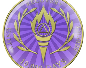 May include: A purple and gold coin with the words "Recovery Service" and "Unity" on the left and right sides of the coin. The center of the coin features a gold flame with a triangle inside, and the words "10,000 Days" at the bottom.