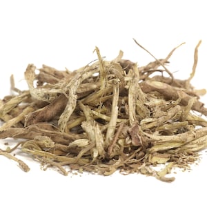 May include: A pile of dried, light brown, and tan roots. The roots are long and thin, and some are slightly thicker than others. The roots are arranged in a loose pile, and some are overlapping.