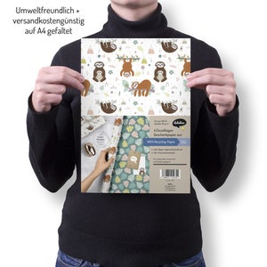 May include: Four sheets of sloth-themed wrapping paper with a green, white, and brown pattern. The paper is made from 100% recycled paper and is printed with the text "dabelino 4 Einzelb&ouml;gen Geschenkpapier aus 100% Recycling-Papier".